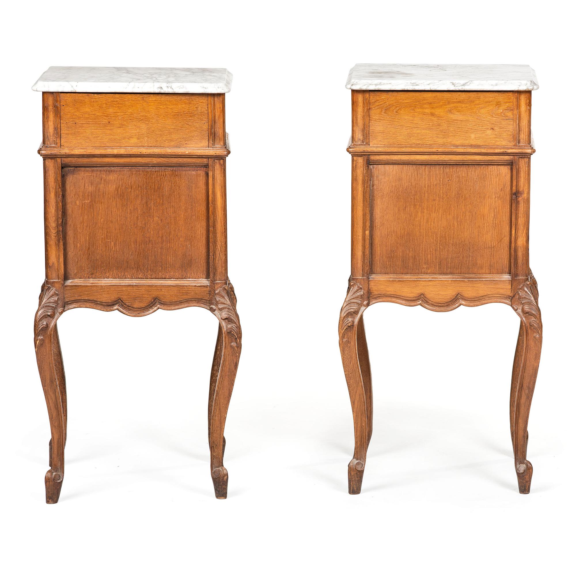 A Pair of Louis XV Provincial Style Carved Oak Marble Top Side Cabinets