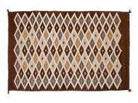 Group of Four Regional Navajo Rugs