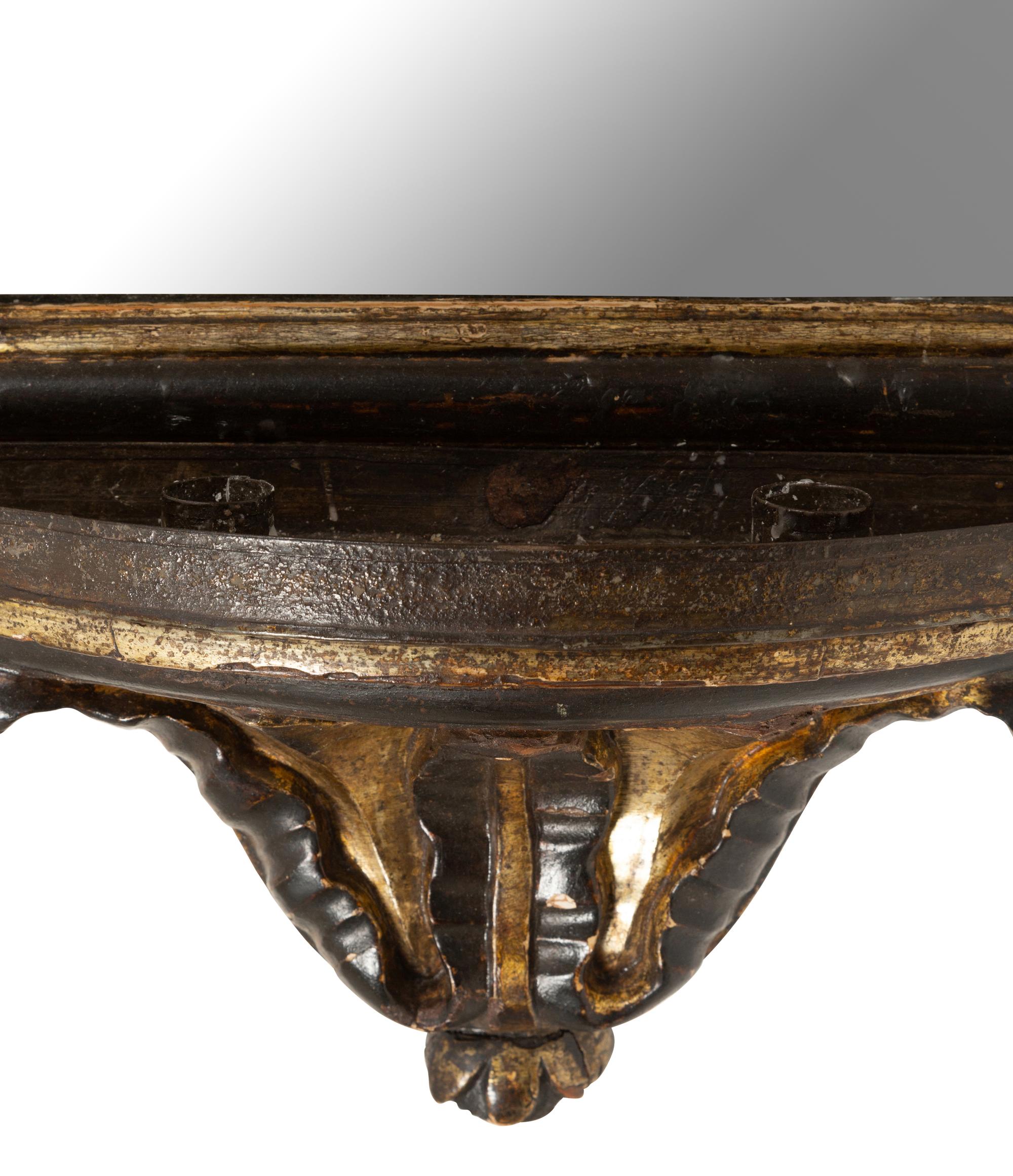 An Italian Baroque Style Painted and Parcel-Gilt Girandole Mirror