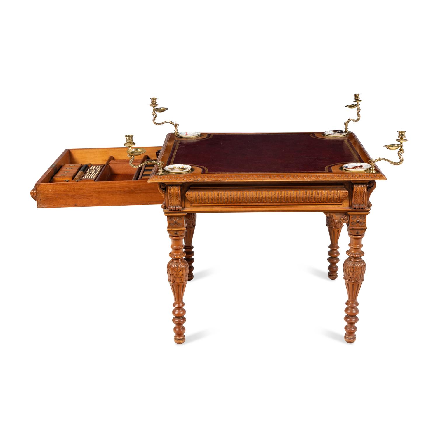 An Edwardian Oak Game Table