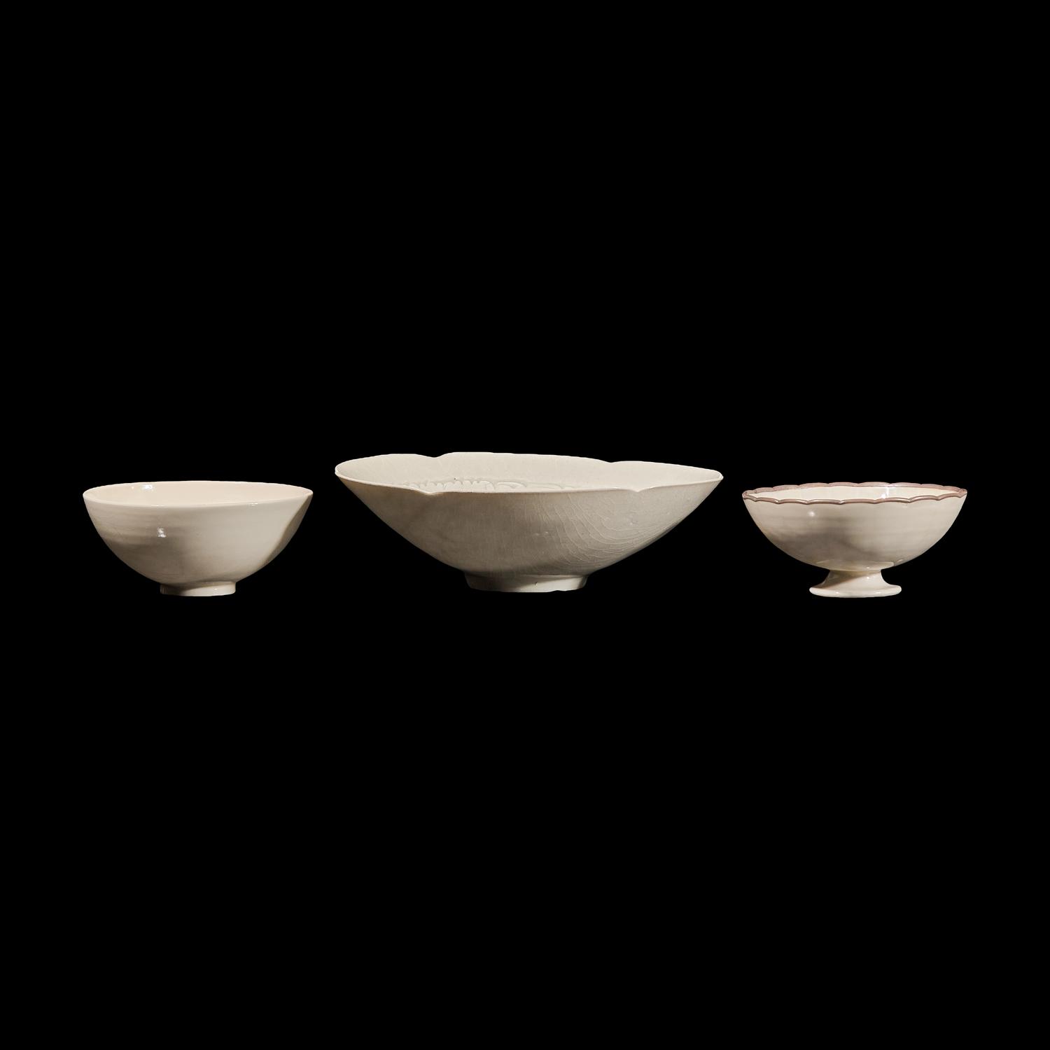 Two Chinese Ding Style Bowls and a Qingbai Glazed Bowl, Song Dynasty or Later 宋或以後 定窯及青白釉碗三隻