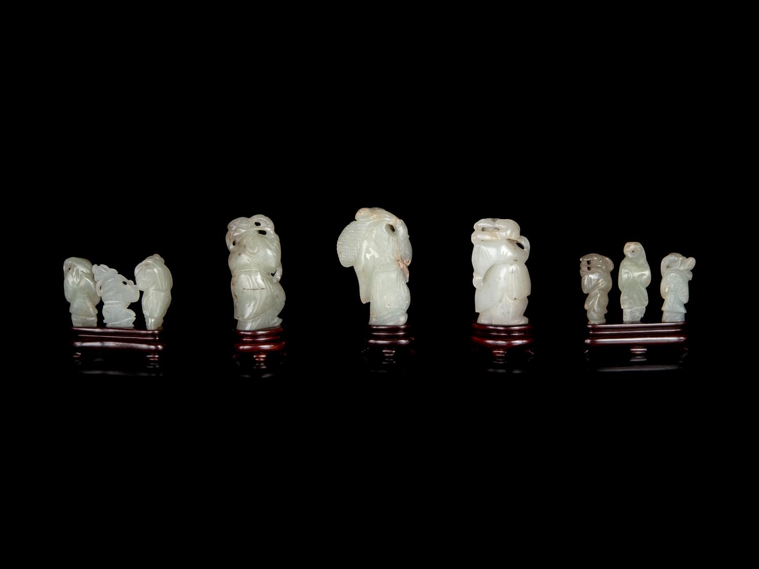 Nine Chinese Carved Celadon Jade Figures of Boys
