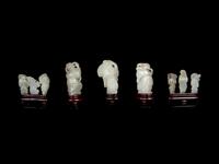 Nine Chinese Carved Celadon Jade Figures of Boys