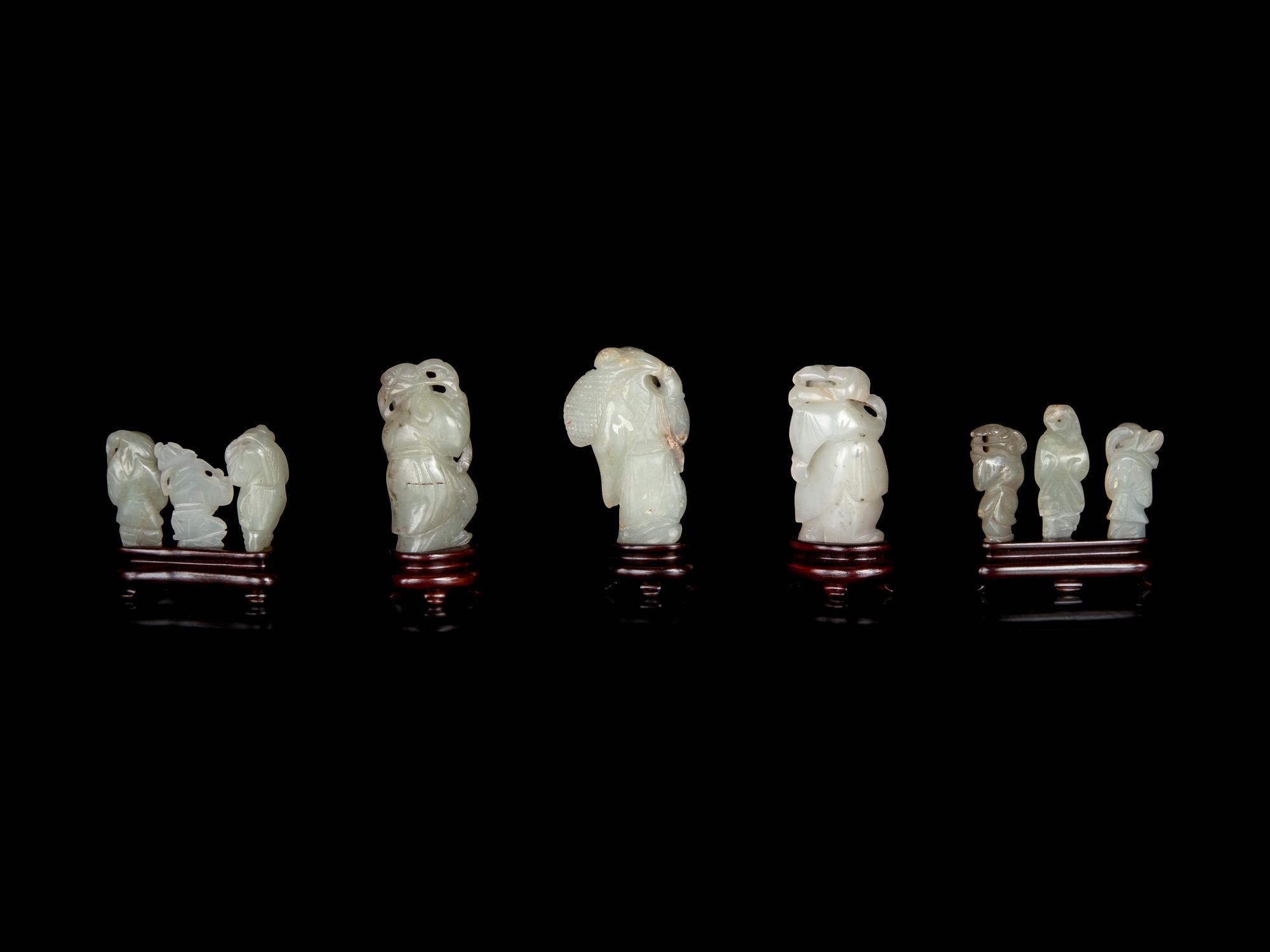 Nine Chinese Carved Celadon Jade Figures of Boys