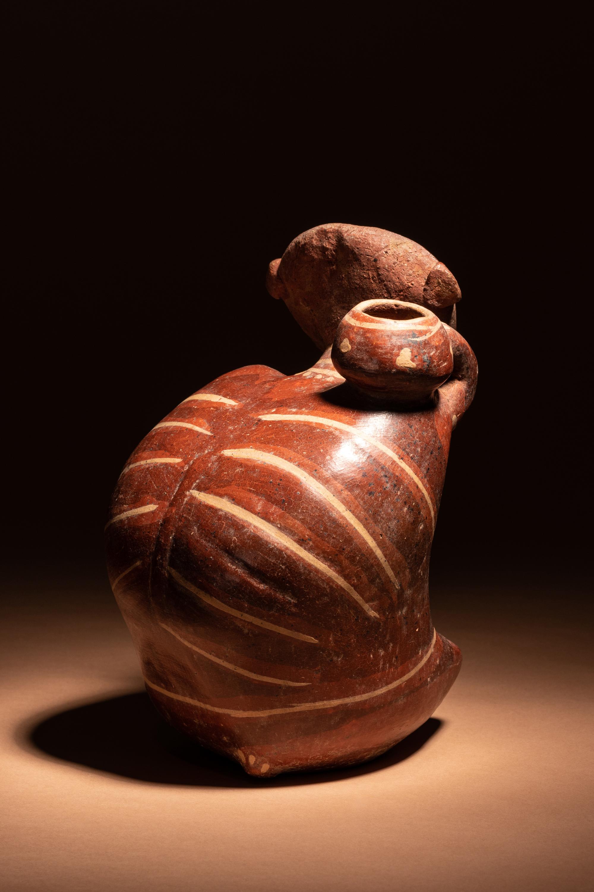 A Nayarit Terracotta Seated Figure