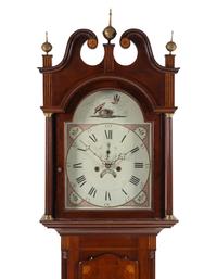 An English Mahogany and Marquetry Tall Case Clock
