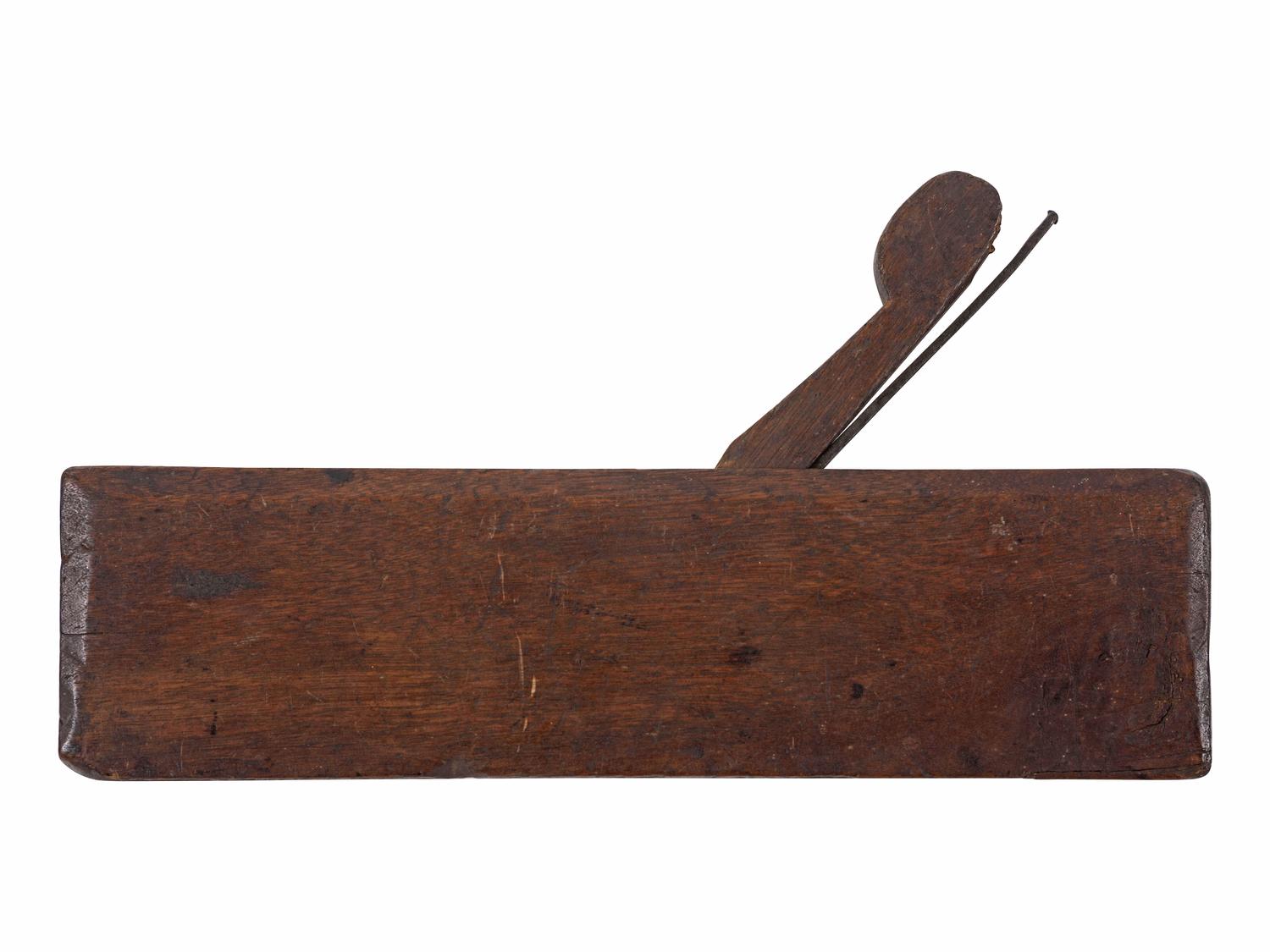[AFRICAN AMERICANA]. Wood molding plane made by Cesar Chelor (ca 1720-1784), the earliest documented African American planemaker in North America. Wrentham, Massachusetts. Ca 1750s-1780s.