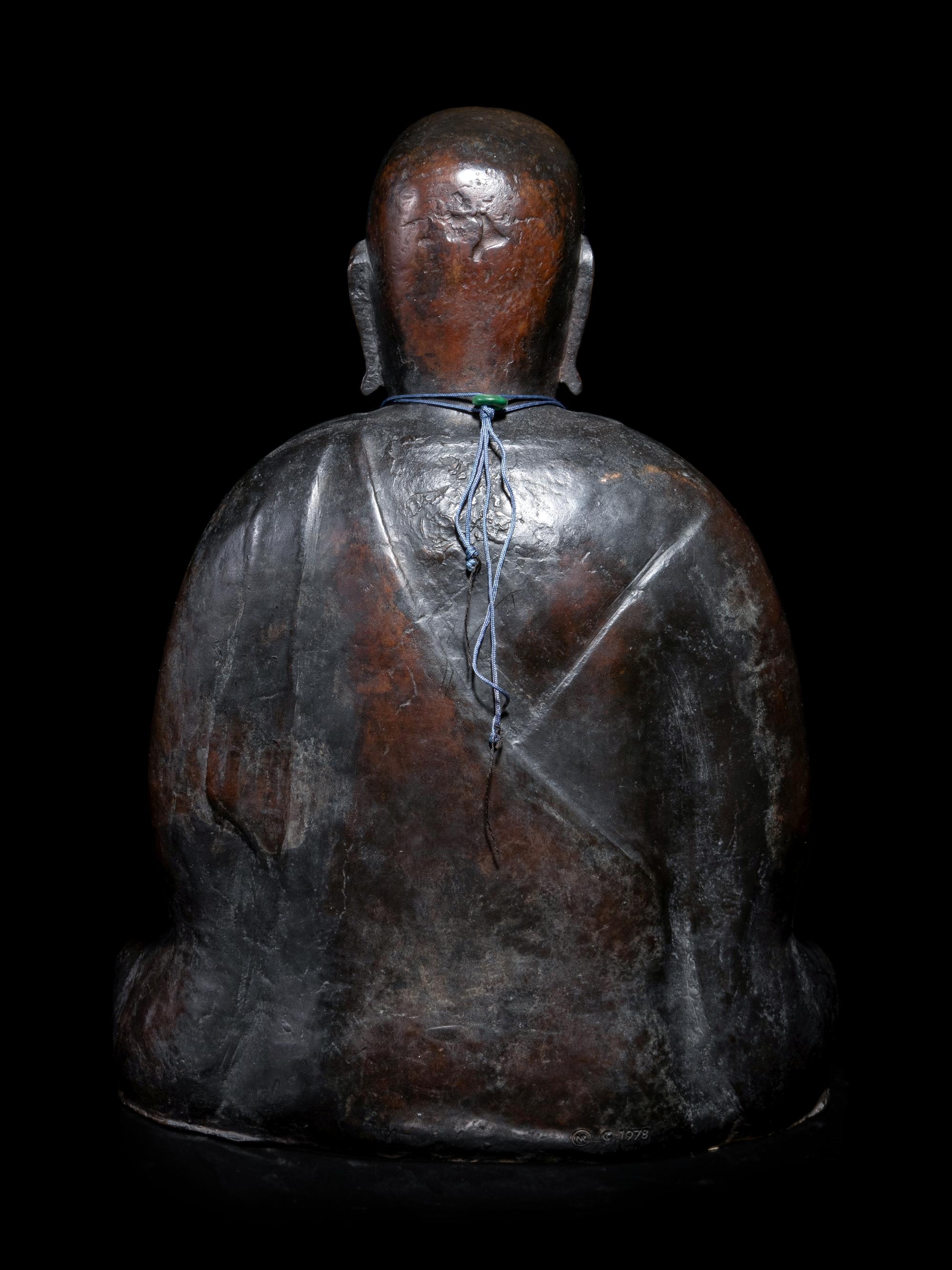 A Chinese Bronze Figure of a Monk