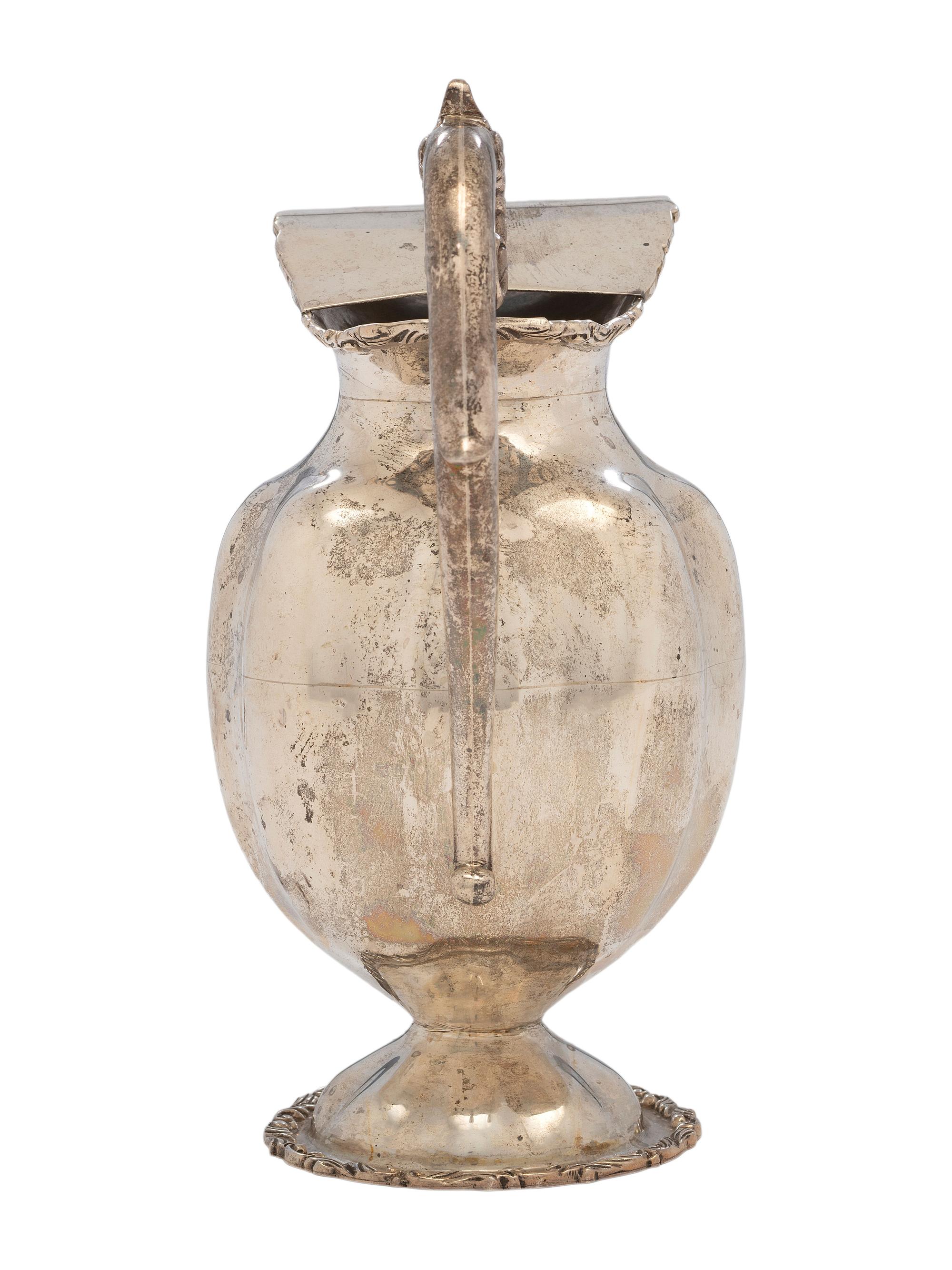 A Silver Water Pitcher