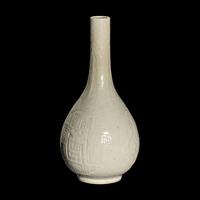 A Chinese Molded White Glazed Porcelain Bottle Vase, 18th/19th Century 清中期 白釉模印如意纹膽瓶