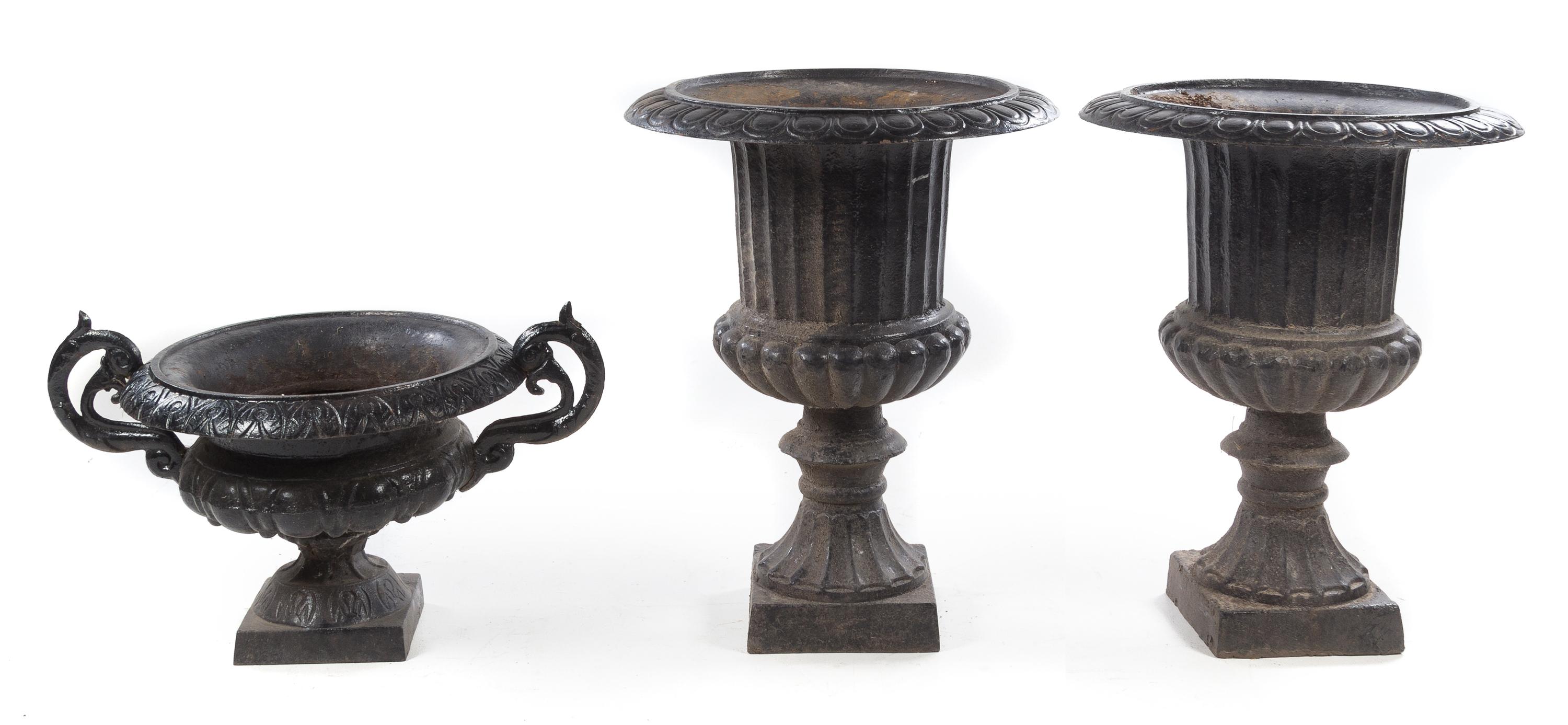 Three Victorian Style Cast Iron Urns Height of tallest 39 inches. — 19TH/20TH CENTURY