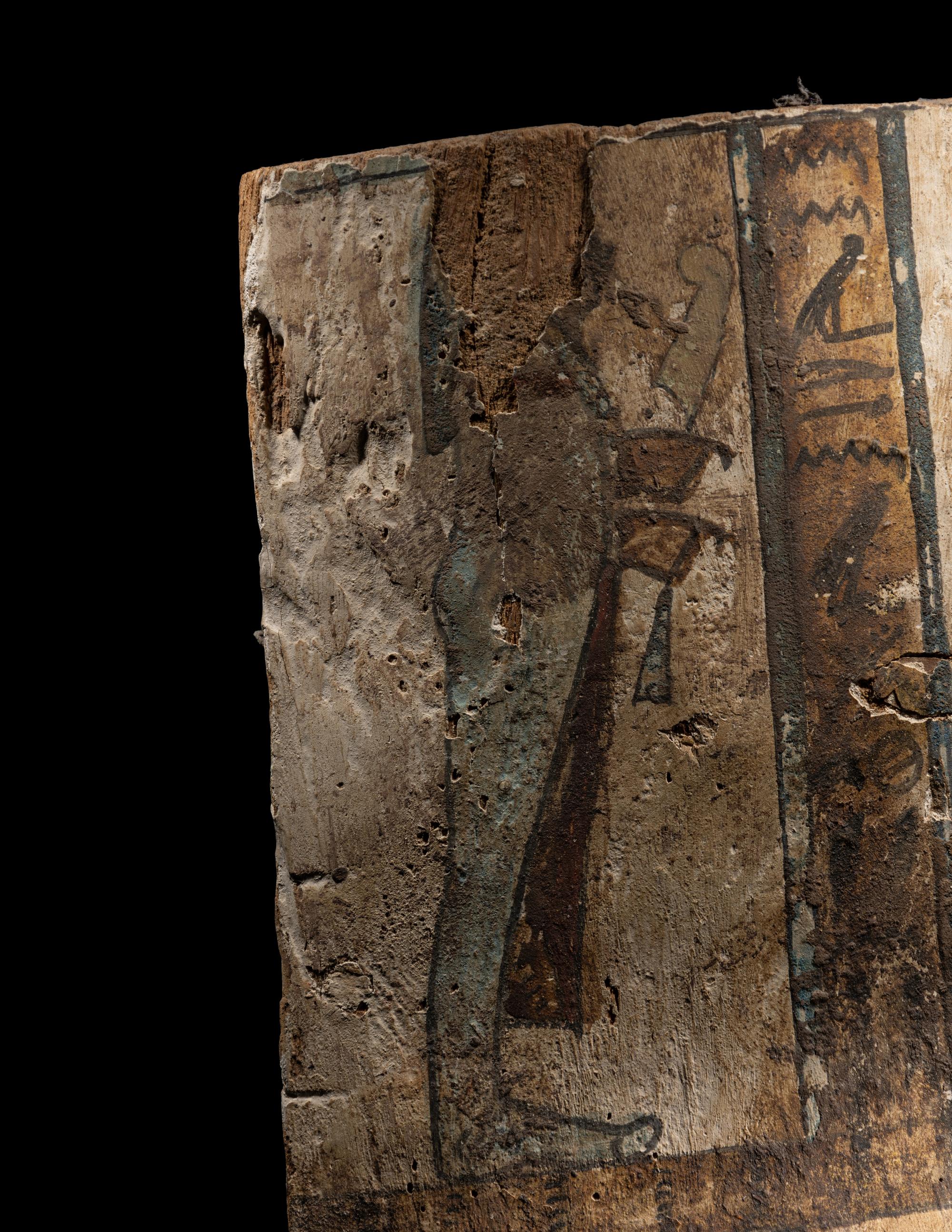 An Egyptian Painted Wood Sarcophagus Panel with the Sons of Horus
