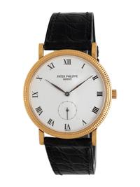 PATEK PHILIPPE, REF. 3919 18K YELLOW GOLD 'CALATRAVA' WATCH