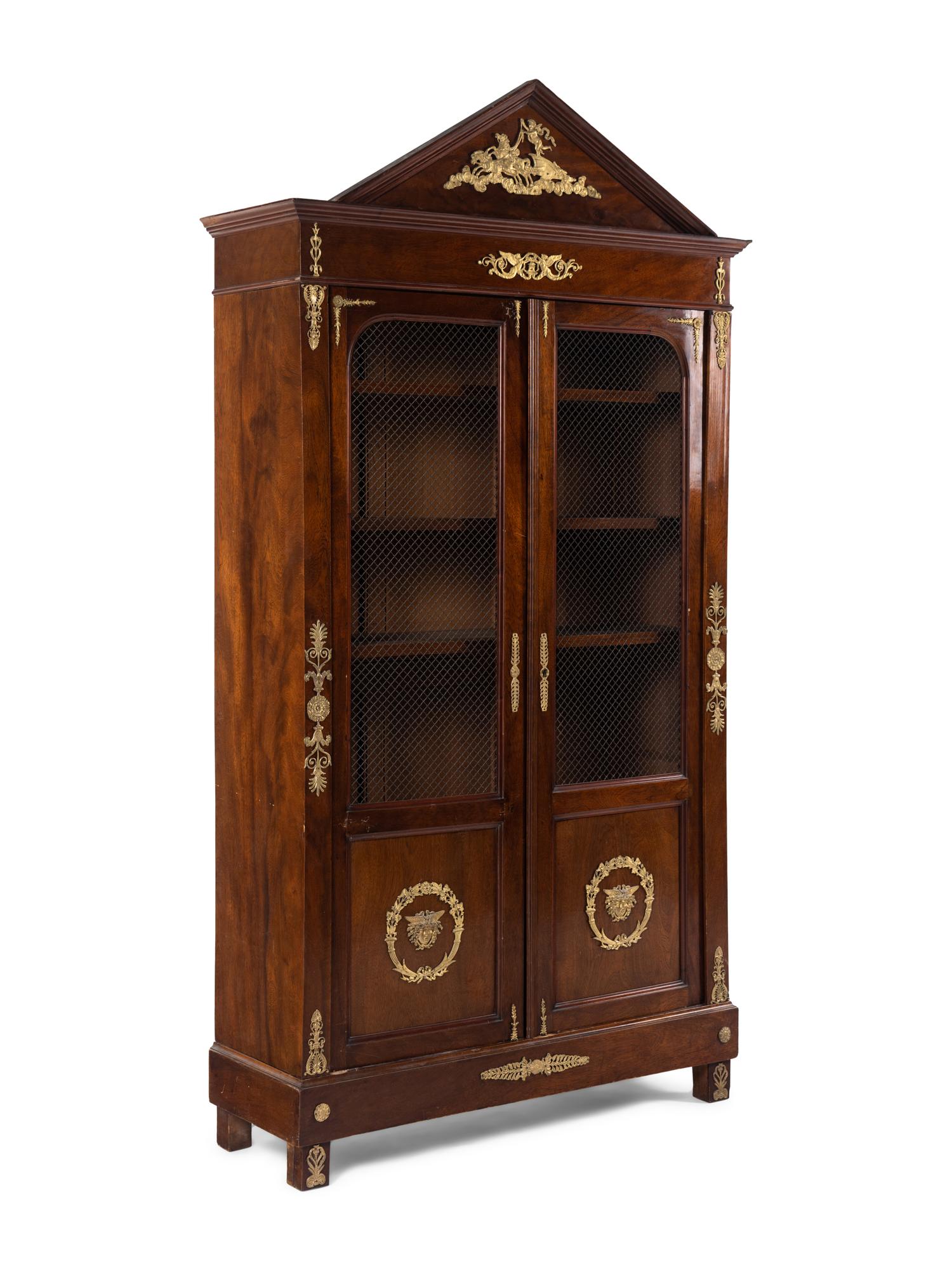 An Empire Style Gilt Metal Mounted Mahogany Bookcase