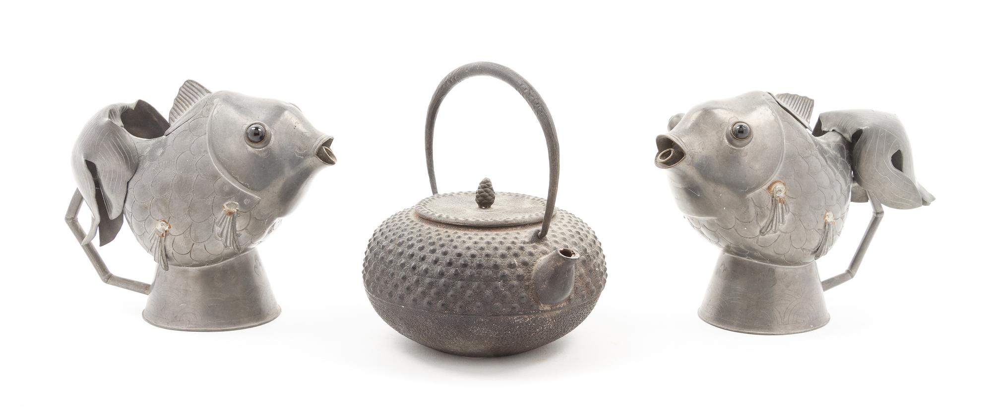 A Pair of Chinese Pewter Fish Form Ewers Height of largest 3 1/4 x diameter 6 inches.