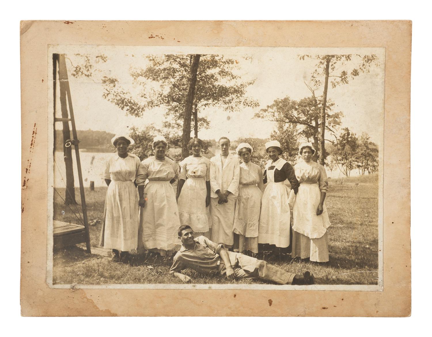 [AFRICAN AMERICANA]. 4 occupational photographs ft. African American subjects wearing uniforms.