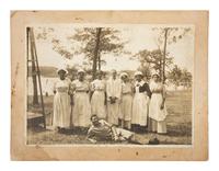 [AFRICAN AMERICANA]. 4 occupational photographs ft. African American subjects wearing uniforms.