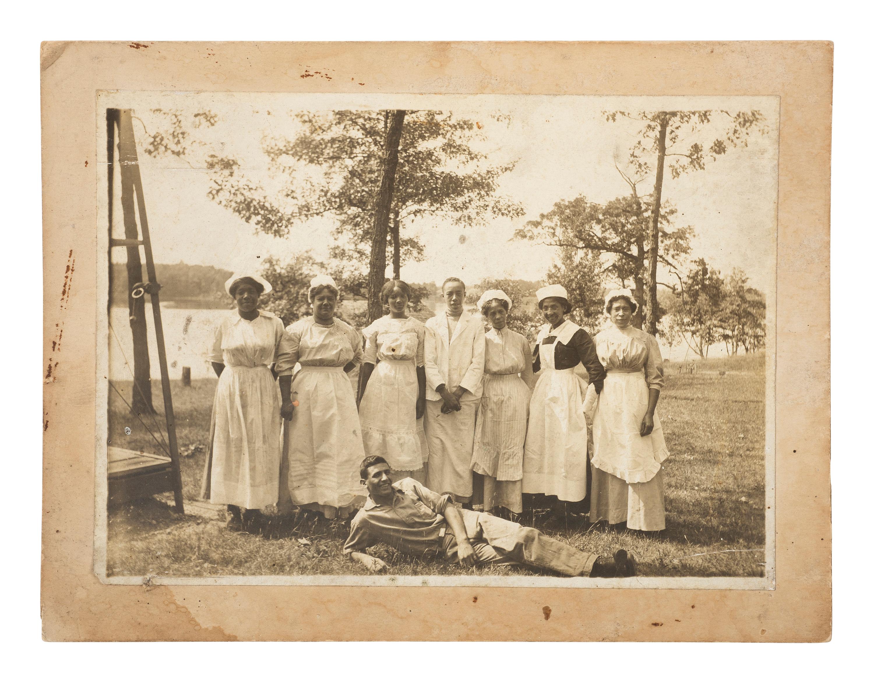 [AFRICAN AMERICANA]. 4 occupational photographs ft. African American subjects wearing uniforms.