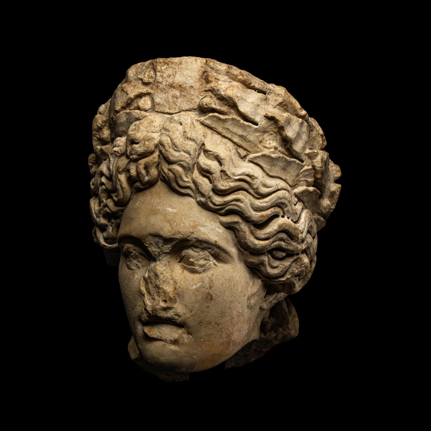 A Roman Marble Head of Apollo Citharoedus