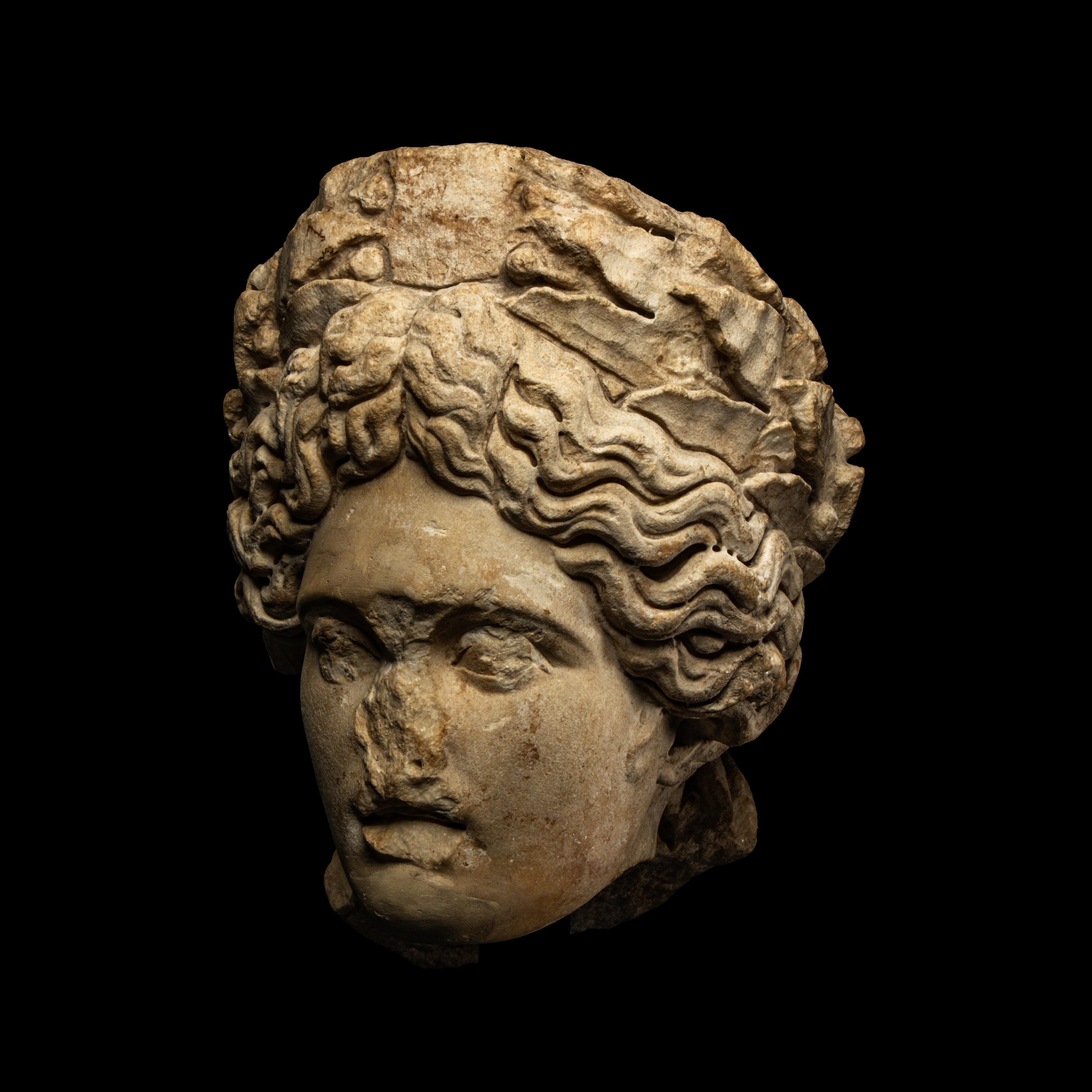 A Roman Marble Head of Apollo Citharoedus