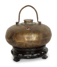 A Chinese Incised Metal Warmer