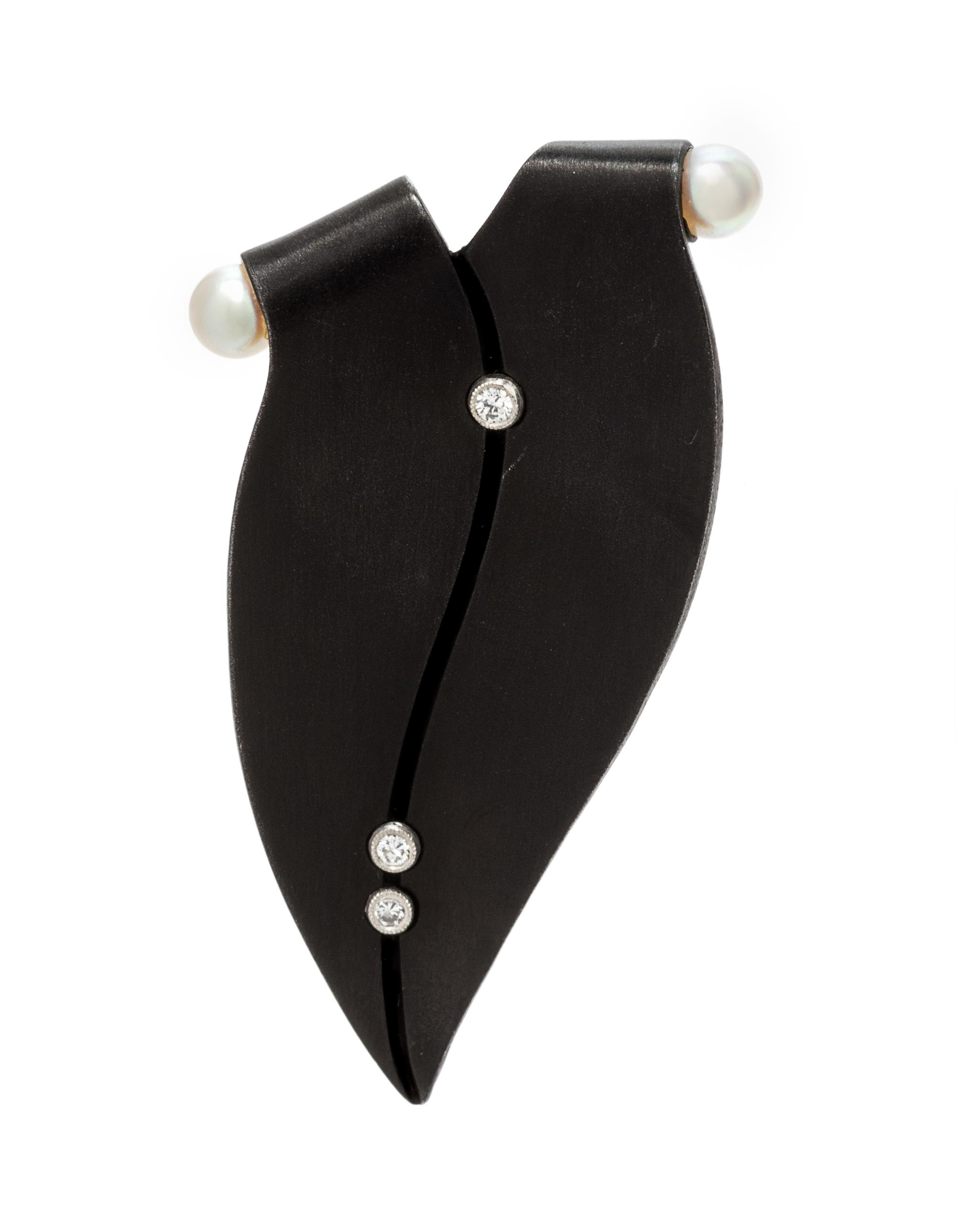 An Art Moderne Blackened Steel, White Gold, Cultured Pearl and Diamond Brooch, Marsh & Co., 5.10 dwts.