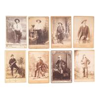 [WESTERN AMERICANA]. A group of 8 cabinet photographs of cowboys and other western personalities, some armed, comprising: