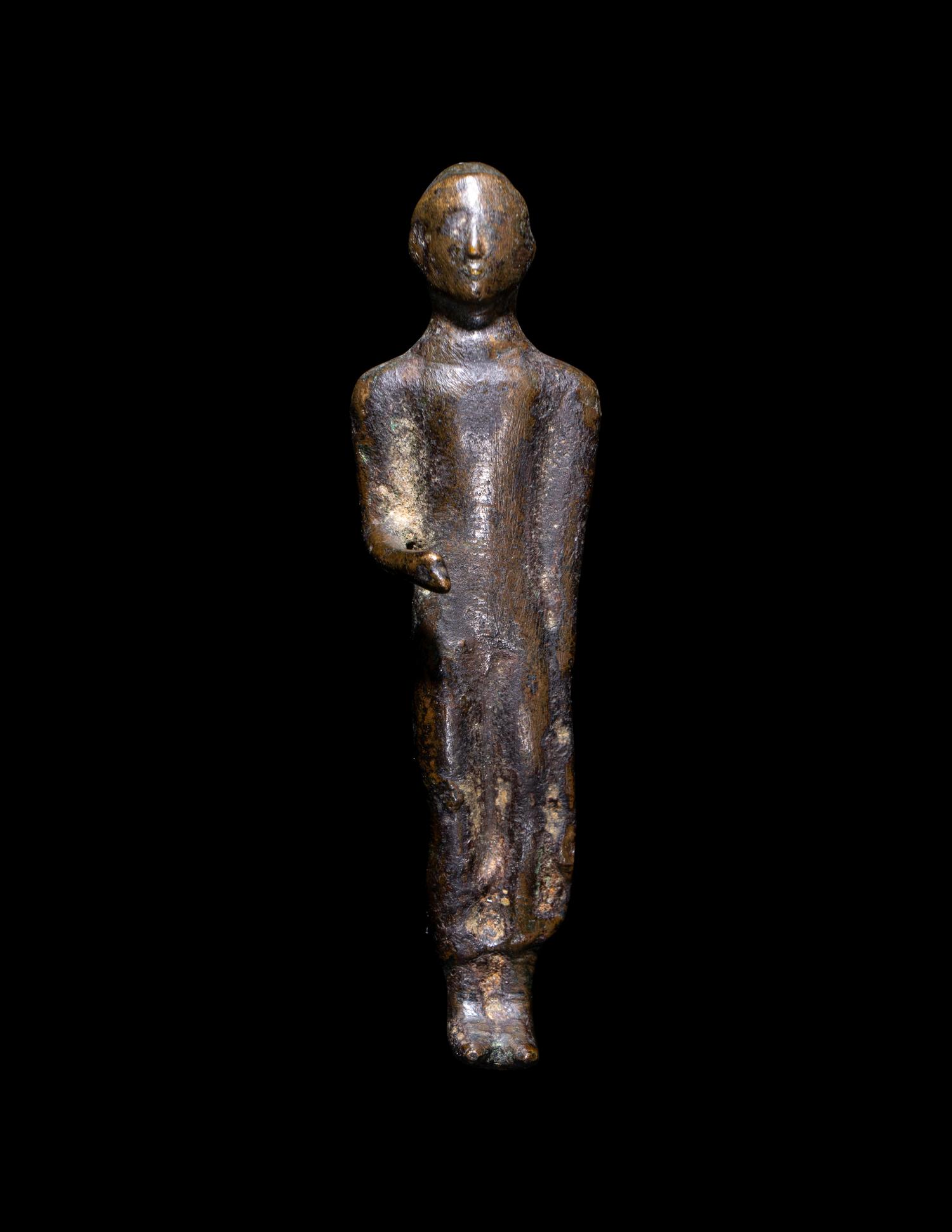 A Greek Bronze Kouros