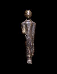 A Greek Bronze Kouros