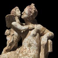 A Neoclassical Terracotta Venus with Eros