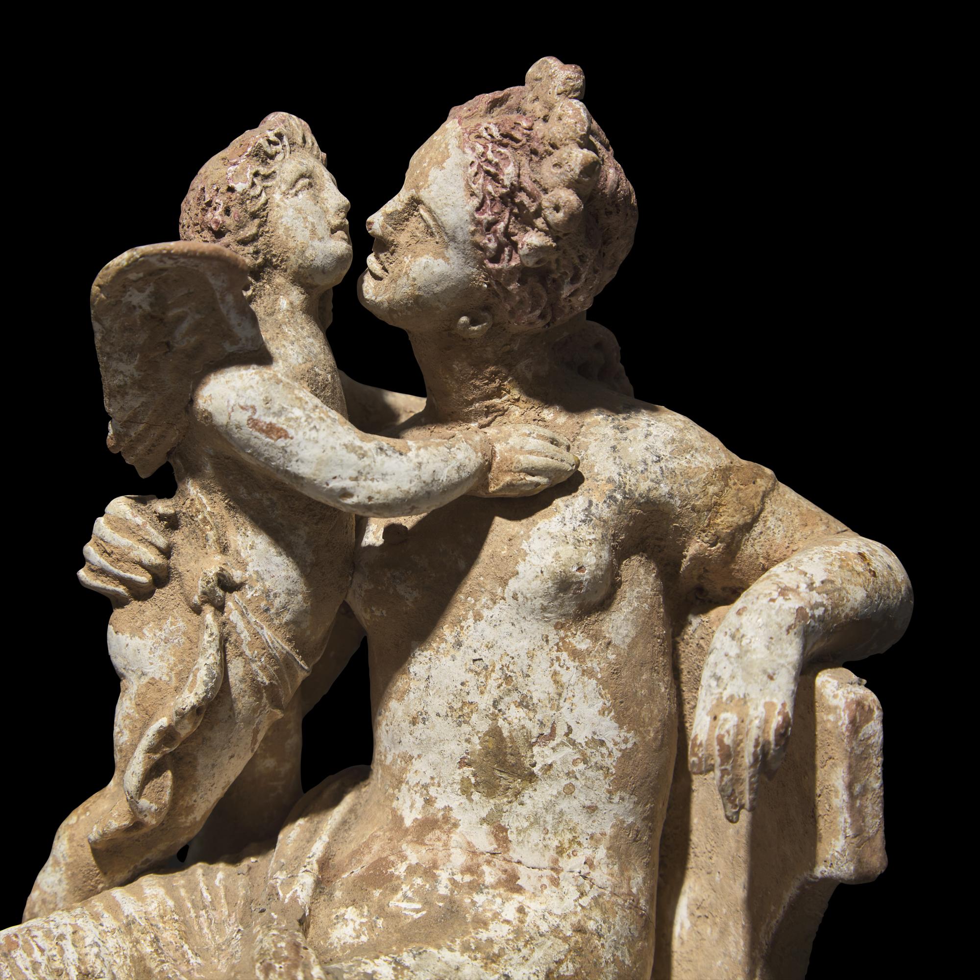 A Neoclassical Terracotta Venus with Eros