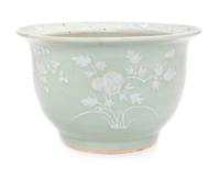 A Chinese White Slip Decorated Celadon Ground Cachepot Height 11 1/2 inches.