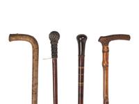 A Group of Eight Canes and Walking Sticks