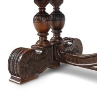 An Italian Renaissance Style Walnut Dining Table