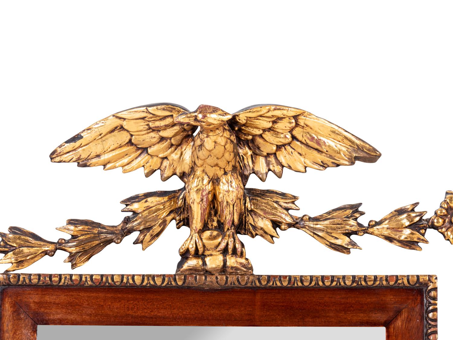 A Federal Style Parcel Gilt Mahogany Eagle-Mounted Looking Glass