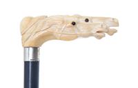 A Carved Ivory Cane, Length of handle 4 1/2 x length overall 39 inches.