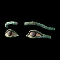 A Pair of Egyptian Bronze Eye Inlays