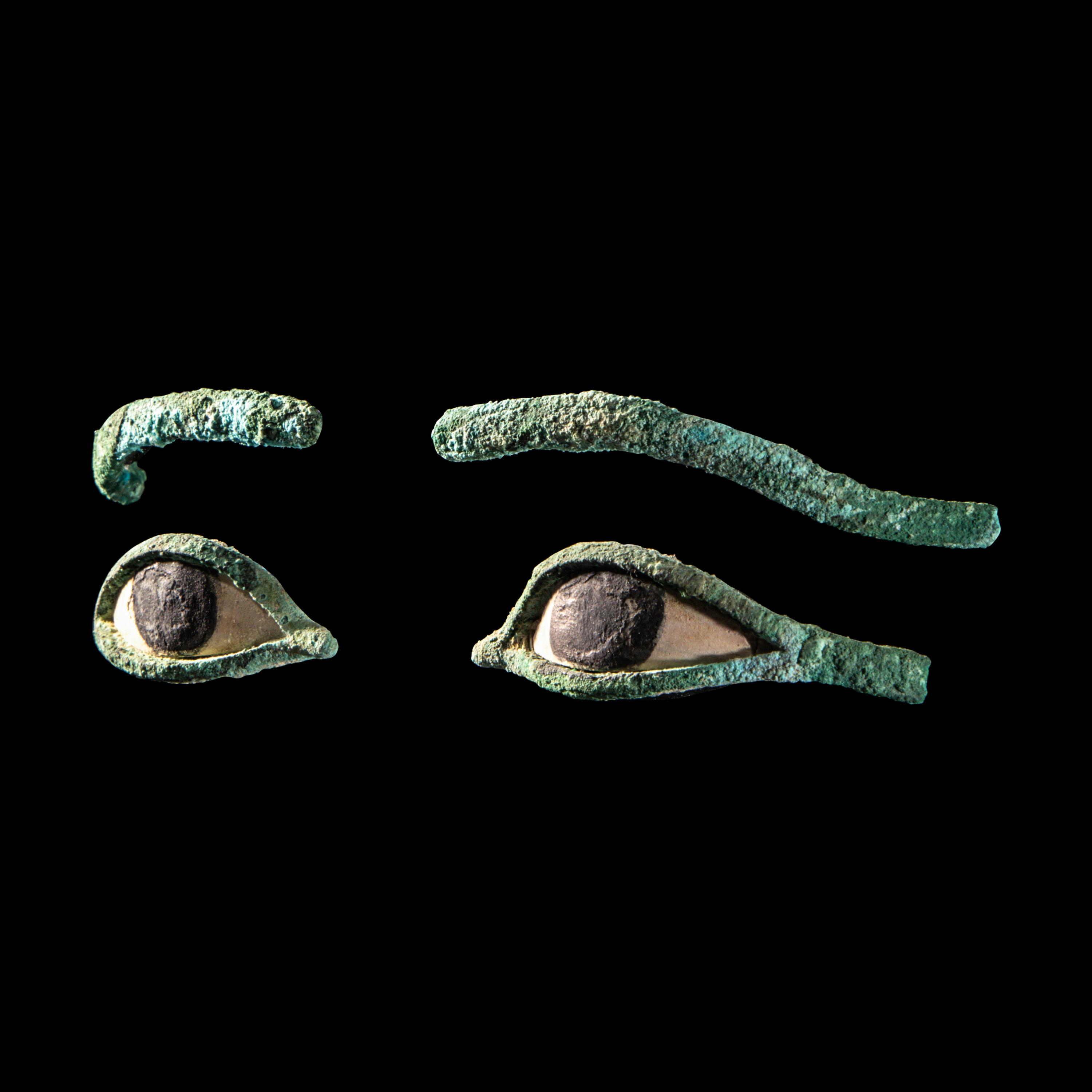 A Pair of Egyptian Bronze Eye Inlays