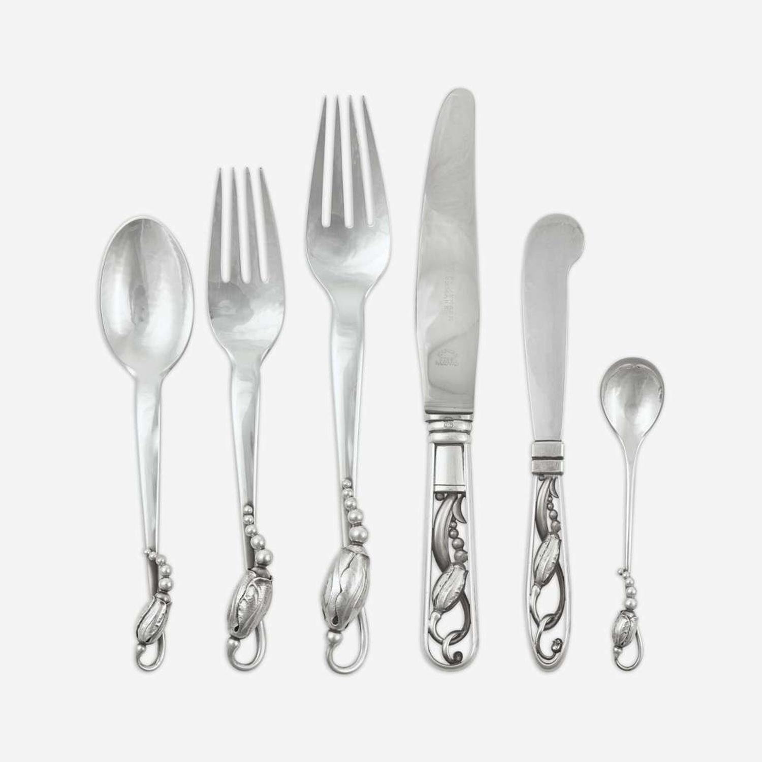 Georg Jensen (Danish, 1866-1935) A Sterling Flatware Service for Twelve in the "Blossom" Pattern, Georg Jensen, Denmark, designed 1919, the present lot late 20th century