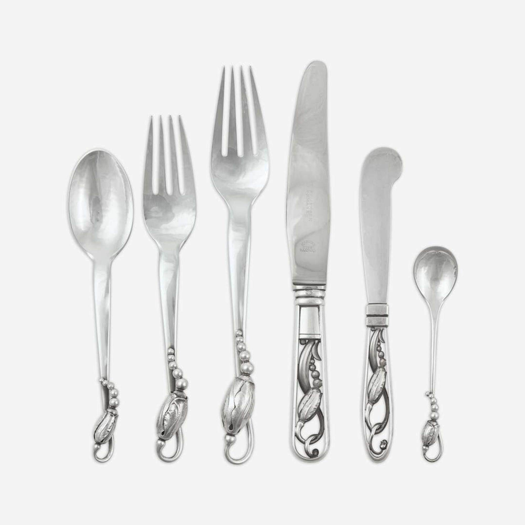 Georg Jensen (Danish, 1866-1935) A Sterling Flatware Service for Twelve in the "Blossom" Pattern, Georg Jensen, Denmark, designed 1919, the present lot late 20th century