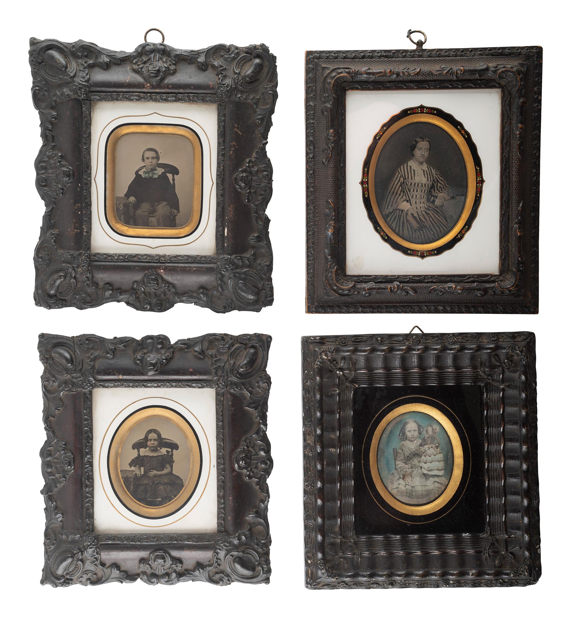 [EARLY PHOTOGRAPHY]. A group of 9 European portraits in wall frames, highlighted by attractive daguerreotypes of men, women, and children, including: