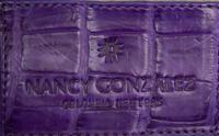 Nancy Gonzalez, Four Purple Bags