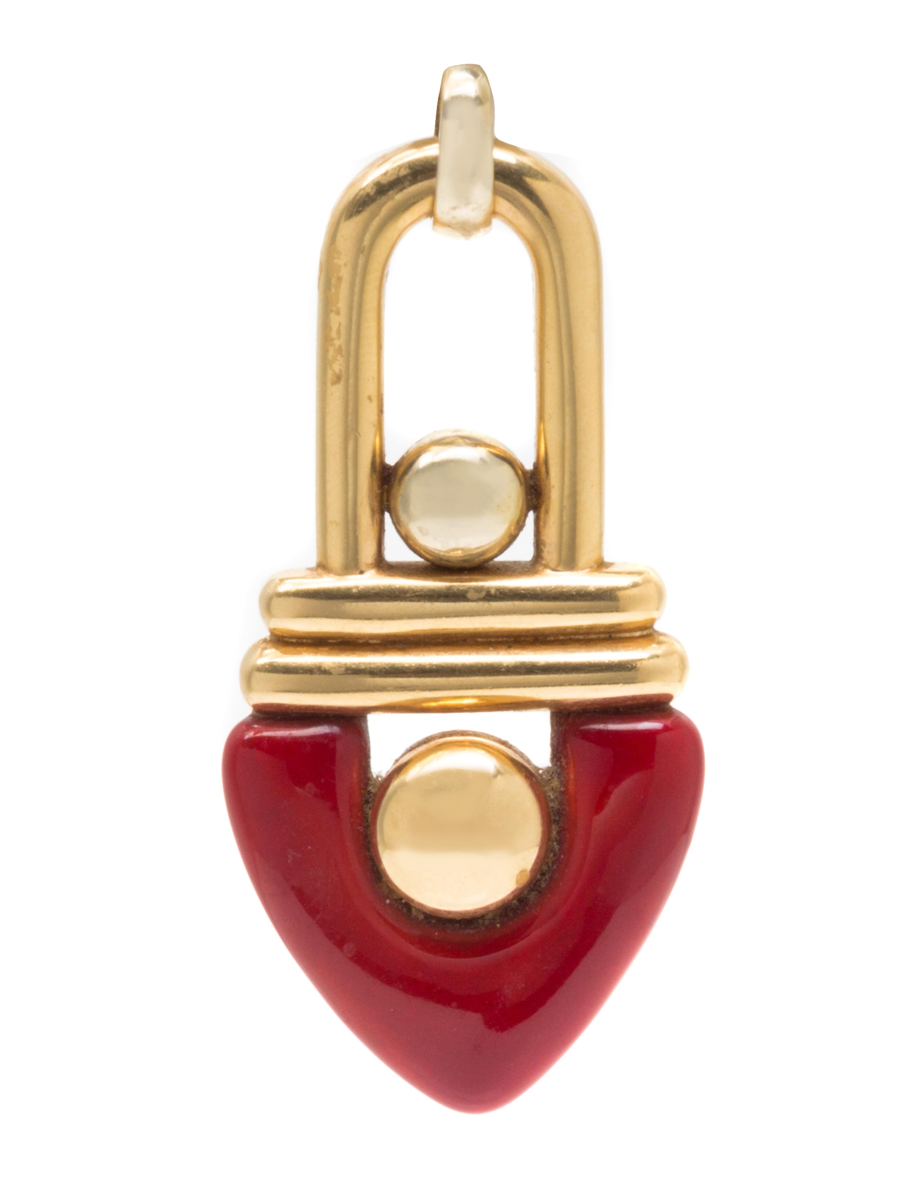 An 18 Karat Yellow Gold and Enamel Pendant, la Nouvelle Bague, 16.40 dwts.