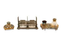 A Group of Enamel and Cast Iron Inkwells