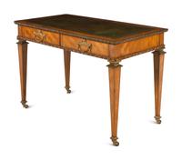 An English Gilt Bronze Mounted Satinwood Writing Table in the Louis XVI Taste