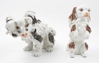 A Pair of Dresden Porcelain Dogs Height of taller 10 1/4 inches. — 20TH CENTURY