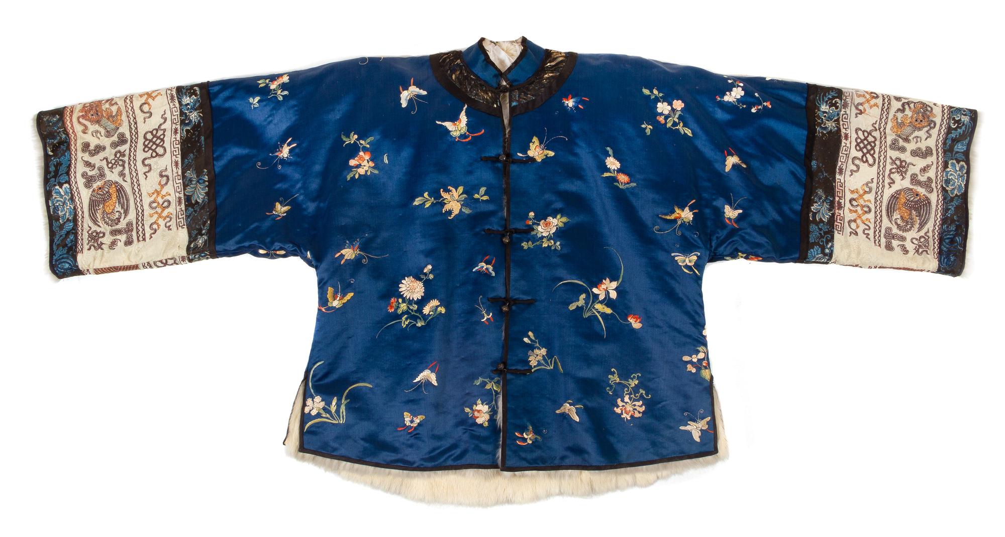 An Embroidered Silk Blue Ground Lady's Winter Jacket Height collar to hem 27 inches. — 19TH CENTURY