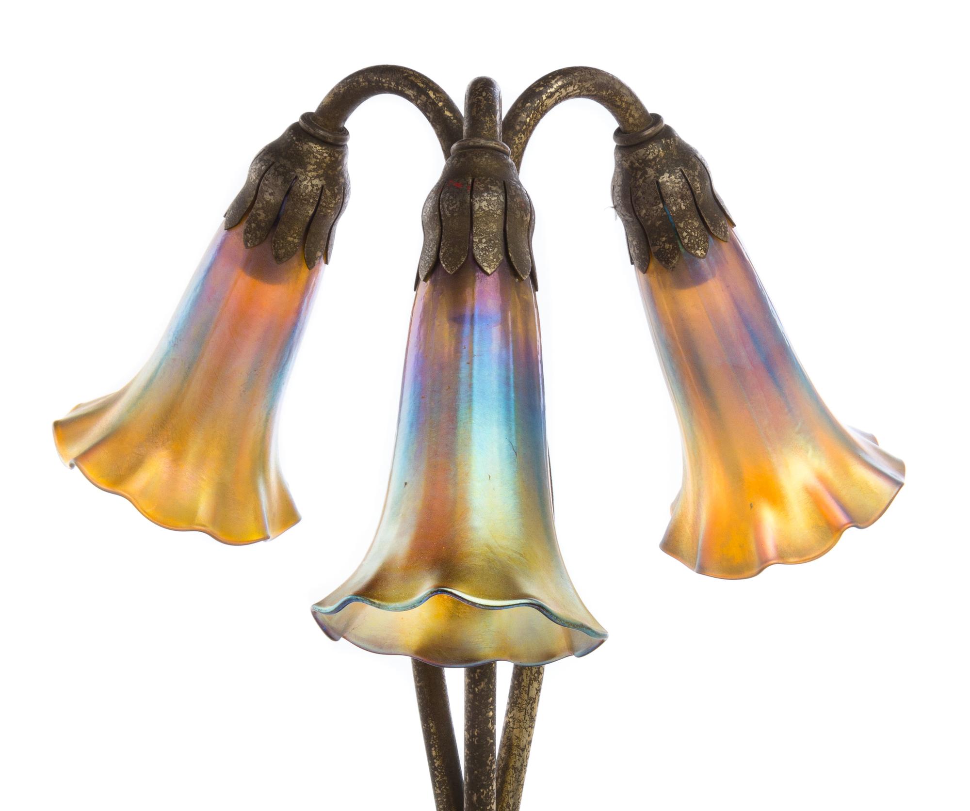 Tiffany Studios, a three-light Lily lamp