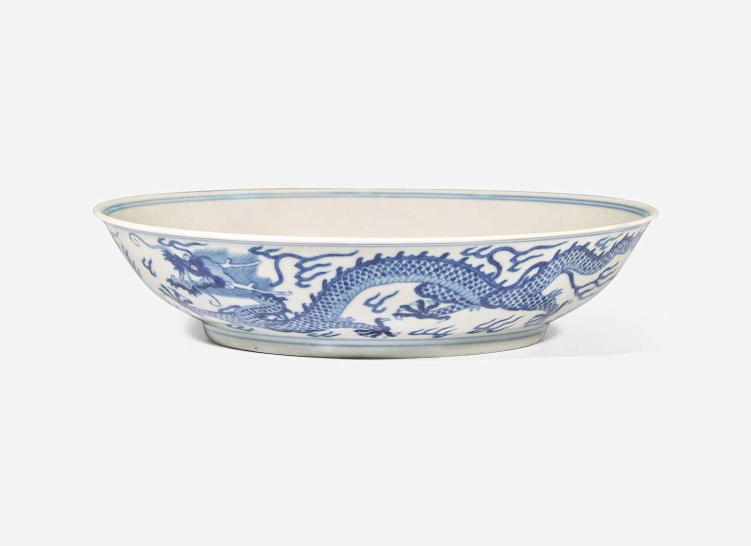 A Chinese blue and white porcelain "Dragon" dish, Jiaqing mark and of the period 青花雲龍紋盤 嘉慶款 清 嘉慶