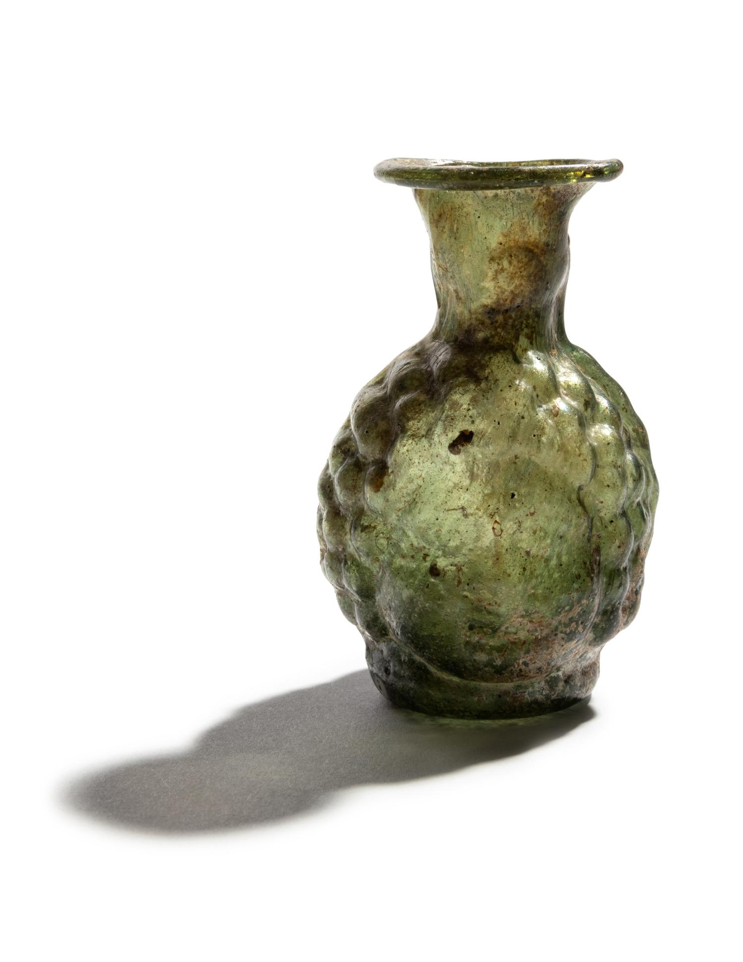 A Roman Glass Double-Head Flask